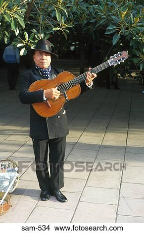 Street Musician With Guitar Buenos Aires Argentina View Large Photo Image Picture - Street Musician With Guitar Buenos Aires Argentina. Fotosearch