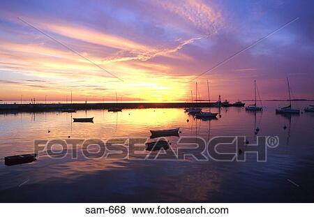 Sunset over Boats in Colonia Harbour Uruguay View Large Photo Image Stock Photo - Sunset over Boats in Colonia Harbour Uruguay. Fotosearch
