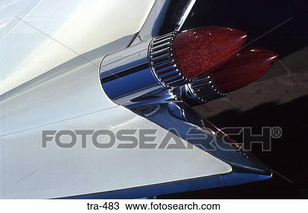 Stock Image - Tail Cluster of White 50s Car. Fotosearch