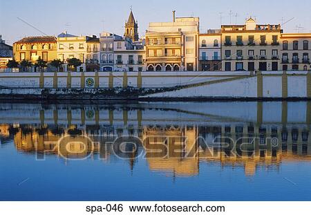 Traditional Buildings on River Bank Seville Spain View Large Photo Image Stock Photograph - Traditional Buildings on River Bank Seville Spain. Fotosearch