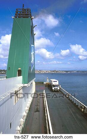 Trucks Driving on Deck of Ship Milford Haven UK View Large Photo Image Stock Photo - Trucks Driving on Deck of Ship Milford Haven UK. Fotosearch