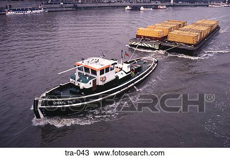 Tug Boat Towing Pontoon on the River Thames UK View Large Photo Image Stock Image - Tug Boat Towing Pontoon on the River Thames UK. Fotosearch