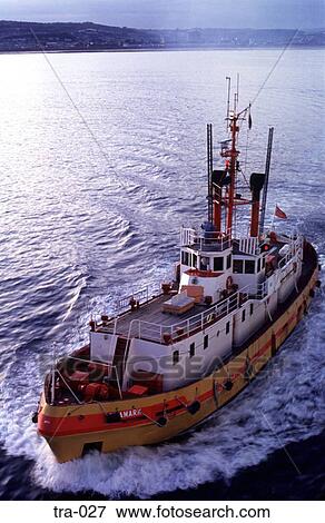 Tug Boat Turning in the Sea Wales View Large Photo Image Stock Photo - Tug Boat Turning in the Sea Wales. Fotosearch