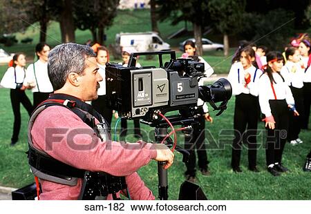 Stock Image - TV Cameraman on Location Buenos Aires Argentina. Fotosearch