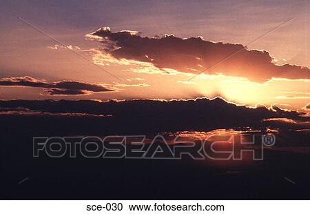 Stock Image - Vivid Sunset and Clouds UK. Fotosearch