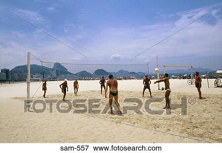 Stock Photo - Volleyball Game Copacabana Beach Rio Brazil. Fotosearch