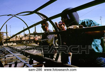 Welders Working on Pipework Venezuela View Large Photo Image Stock Photograph - Welders Working on Pipework Venezuela. Fotosearch