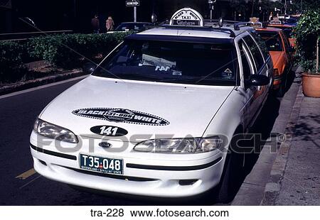 White Taxi in Brisbane Australia View Large Photo Image Stock Photo - White Taxi in Brisbane Australia. Fotosearch