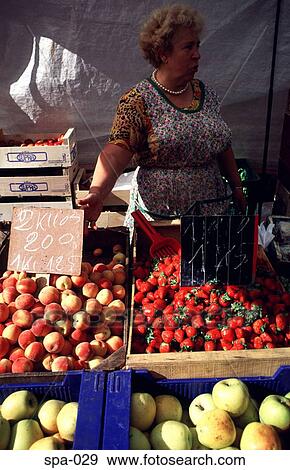 Woman at Fruit Stall Sanfander Spain View Large Photo Image Stock Photo - Woman at Fruit Stall Sanfander Spain. Fotosearch