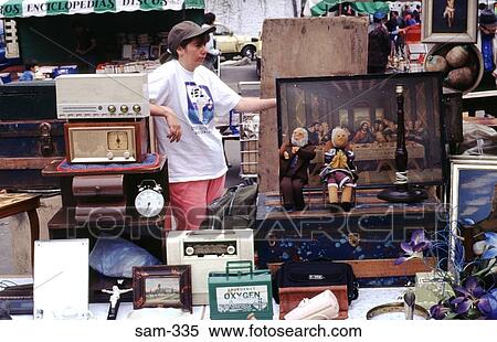 Stock Photography - Woman in Flea Market Bogota Colombia. Fotosearch