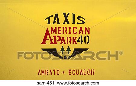 Stock Image - Yellow and Black Taxi Sign on Taxi Door Ecuador. Fotosearch