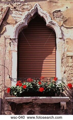 Stock Image - Arched Shuttered Window Venice Italy. Fotosearch