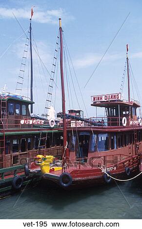 Stock Photography - Boats in Halong City Harbour Vietnam. Fotosearch