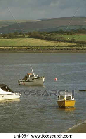 Boats in Lougher Estuary Wales UK View Large Photo Image Stock Photo - Boats in Lougher Estuary Wales UK. Fotosearch
