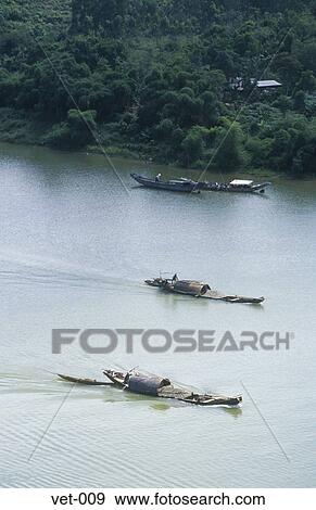 Boats on the Perfume River Vietnam Asia View Large Photo Image Stock Photo - Boats on the Perfume River Vietnam Asia. Fotosearch