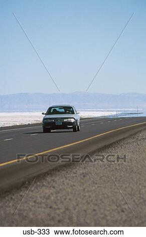 Car on Great Salt Lake Desert Road Utah USA View Large Photo Image Stock Image - Car on Great Salt Lake Desert Road Utah USA. Fotosearch