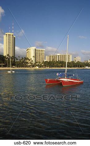 Catamaran in Lagoon Waikiki Beach Honolulu Oahu Hawaii USA View Large Photo Image Stock Image - Catamaran in Lagoon Waikiki Beach Honolulu Oahu Hawaii USA. Fotosearch