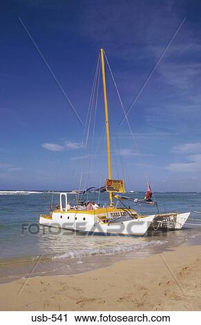 Catamaran on Waikiki Beach Oahu Hawaii USA View Large Photo Image Stock Image - Catamaran on Waikiki Beach Oahu Hawaii USA. Fotosearch