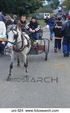 Picture - Children Driving Cart UK. Fotosearch