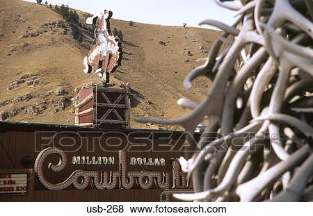Stock Photo - Cowboy Shop Sign Jackson Wyoming USA. Fotosearch