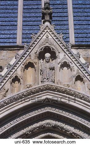 Stock Photography - Figure of Bishop on Minster Door York UK. Fotosearch