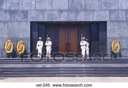 Stock Photography - Guards outside Ho Chi Minh's Mausoleum Hanoi Vietnam. Fotosearch