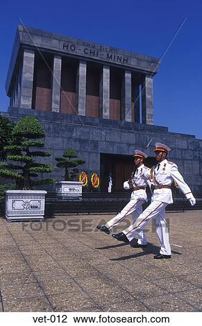 Stock Image - Guards outside the Ho Chi Minh Mausoleum Hanoi Vietnam Asia. Fotosearch