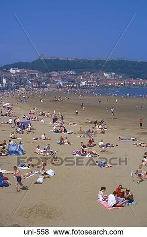 Holidaymakers on Scarborough Beach UK View Large Photo Image Stock Photo - Holidaymakers on Scarborough Beach UK. Fotosearch