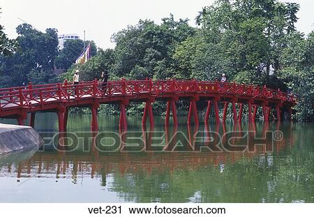Stock Image - Huc Bridge over Hoan Kiem Lake Hanoi Vietnam. Fotosearch