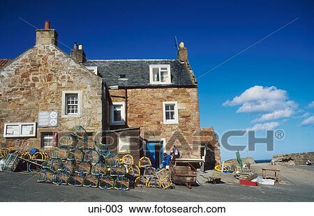 Lobsterpots and Tackle by Seaside Cottage Scotland View Large Photo Image Stock Image - Lobsterpots and Tackle by Seaside Cottage Scotland. Fotosearch