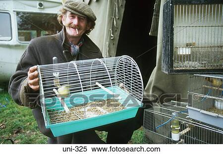 Man Selling Birds at Country Fair UK View Large Photo Image Stock Photography - Man Selling Birds at Country Fair UK. Fotosearch