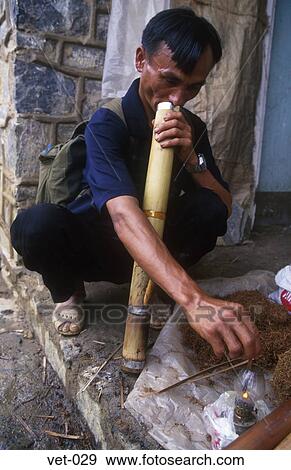 Man Smoking Dieu Clay Vietnam Asia View Large Photo Image Stock Photo - Man Smoking Dieu Clay Vietnam Asia. Fotosearch
