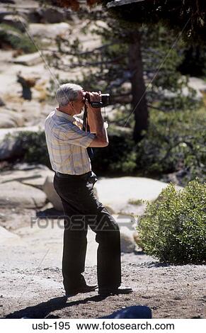 Man Using Camcorder Yosemite National Park USA View Large Photo Image Stock Photography - Man Using Camcorder Yosemite National Park USA. Fotosearch