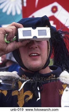Stock Photo - Medieval Man Looking at 3D Viewer Tewkesbury Medieval Festival UK. Fotosearch