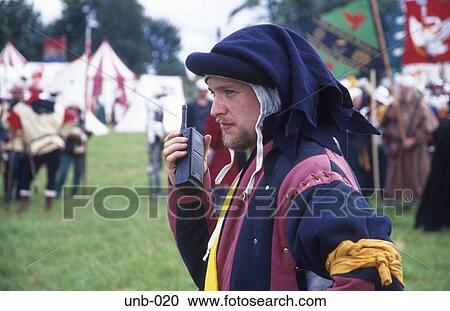 Medieval Man with Walkie Talkie Tewkesbury Medieval Festival UK View Large Photo Image Stock Image - Medieval Man with Walkie Talkie Tewkesbury Medieval Festival UK. Fotosearch