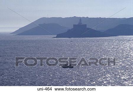 Mumbles lighthouse and Coast Swansea Bay Wales View Large Photo Image Picture - Mumbles lighthouse and Coast Swansea Bay Wales. Fotosearch