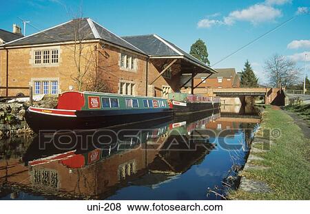 Stock Photo - Narrowboats Tied Up in Welshpool Canal Wales. Fotosearch