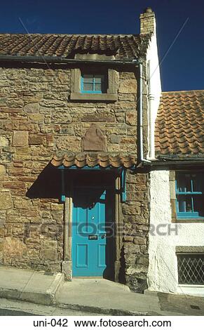 Stock Image - Painted Doorway in Old Farmhouse Scotland. Fotosearch
