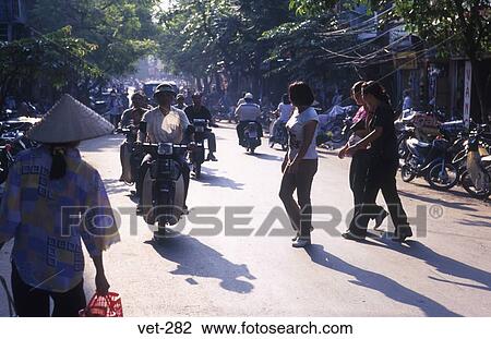 Pedestrians and Mopeds Hanoi Vietnam View Large Photo Image Stock Image - Pedestrians and Mopeds Hanoi Vietnam. Fotosearch