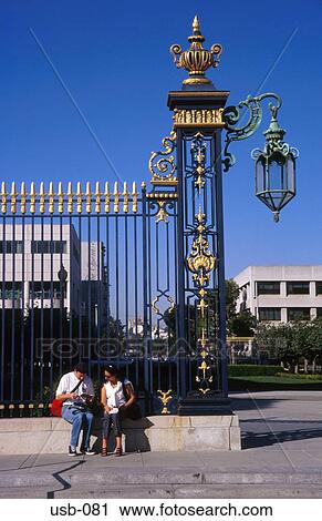 Stock Image - People By Railings of San Francisco Opera House USA. Fotosearch
