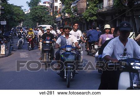 People Riding Mopeds Hanoi Vietnam View Large Photo Image Stock Image - People Riding Mopeds Hanoi Vietnam. Fotosearch