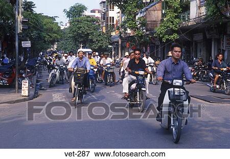 People Riding Mopeds Hanoi Vietnam View Large Photo Image Stock Photo - People Riding Mopeds Hanoi Vietnam. Fotosearch