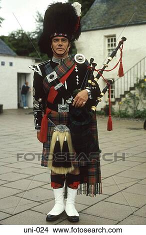 Piper in Highland Uniform Scotland View Large Photo Image Picture - Piper in Highland Uniform Scotland. Fotosearch