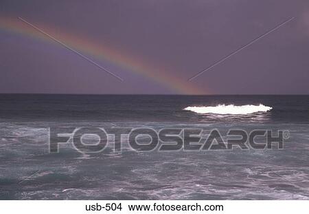Picture - Rainbow over the Sea The North Shore Hawaii USA. Fotosearch