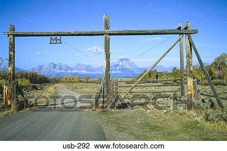 Stock Image - Ranch Gate with MH Brand Wyoming USA. Fotosearch