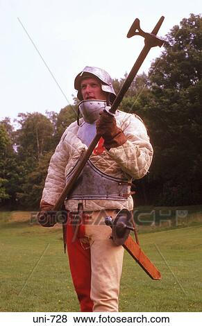 Reenactor Dressed in Armour with War Hammer UK View Large Photo Image Stock Photo - Reenactor Dressed in Armour with War Hammer UK. Fotosearch