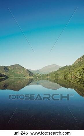 Reflections of Mountain Landscape in Lake Wales UK View Large Photo Image Stock Photography - Reflections of Mountain Landscape in Lake Wales UK. Fotosearch