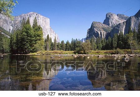 Stock Photo - River in Wooded Gorge Yosemite National Park USA. Fotosearch