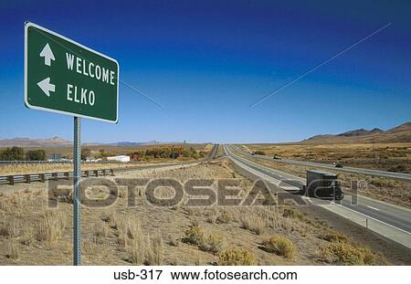 Road Passing Signpost Nevada Desert USA View Large Photo Image Stock Photo - Road Passing Signpost Nevada Desert USA. Fotosearch