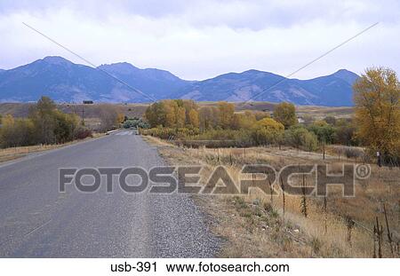 Road through Natural Landscape Montana USA View Large Photo Image Stock Image - Road through Natural Landscape Montana USA. Fotosearch